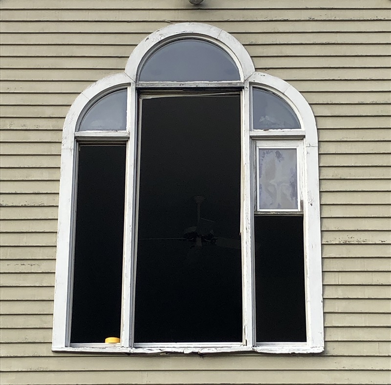 The sill of this wood window is rotting